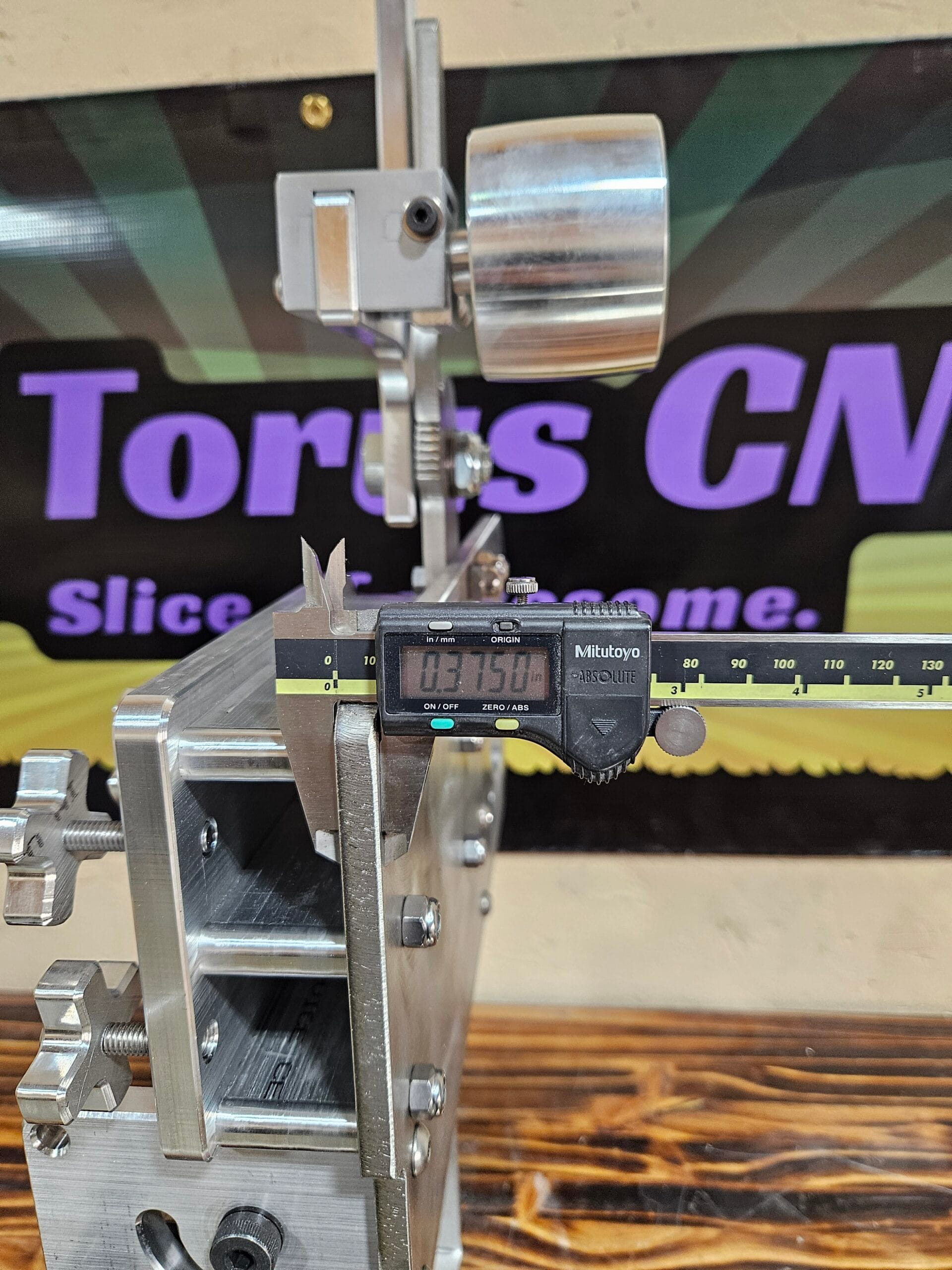 Torus CNC 2x72 belt grinder chassis with tracking and tooling arm.