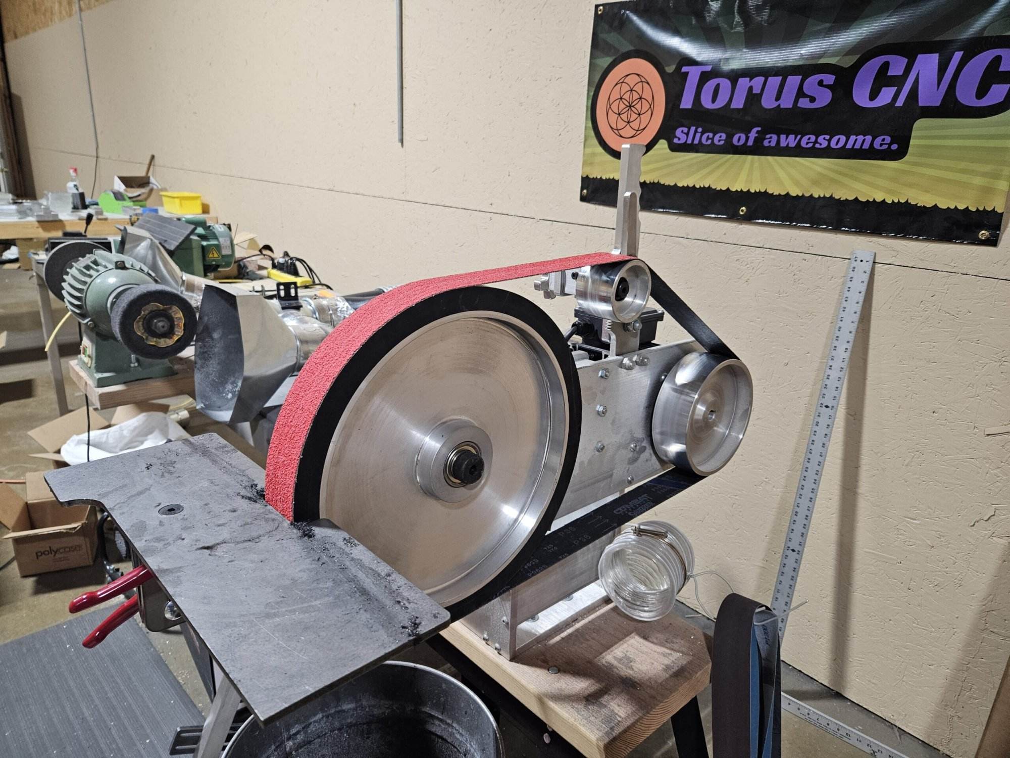 14 inch contact wheel on the 2x72 belt grinder from Torus CNC