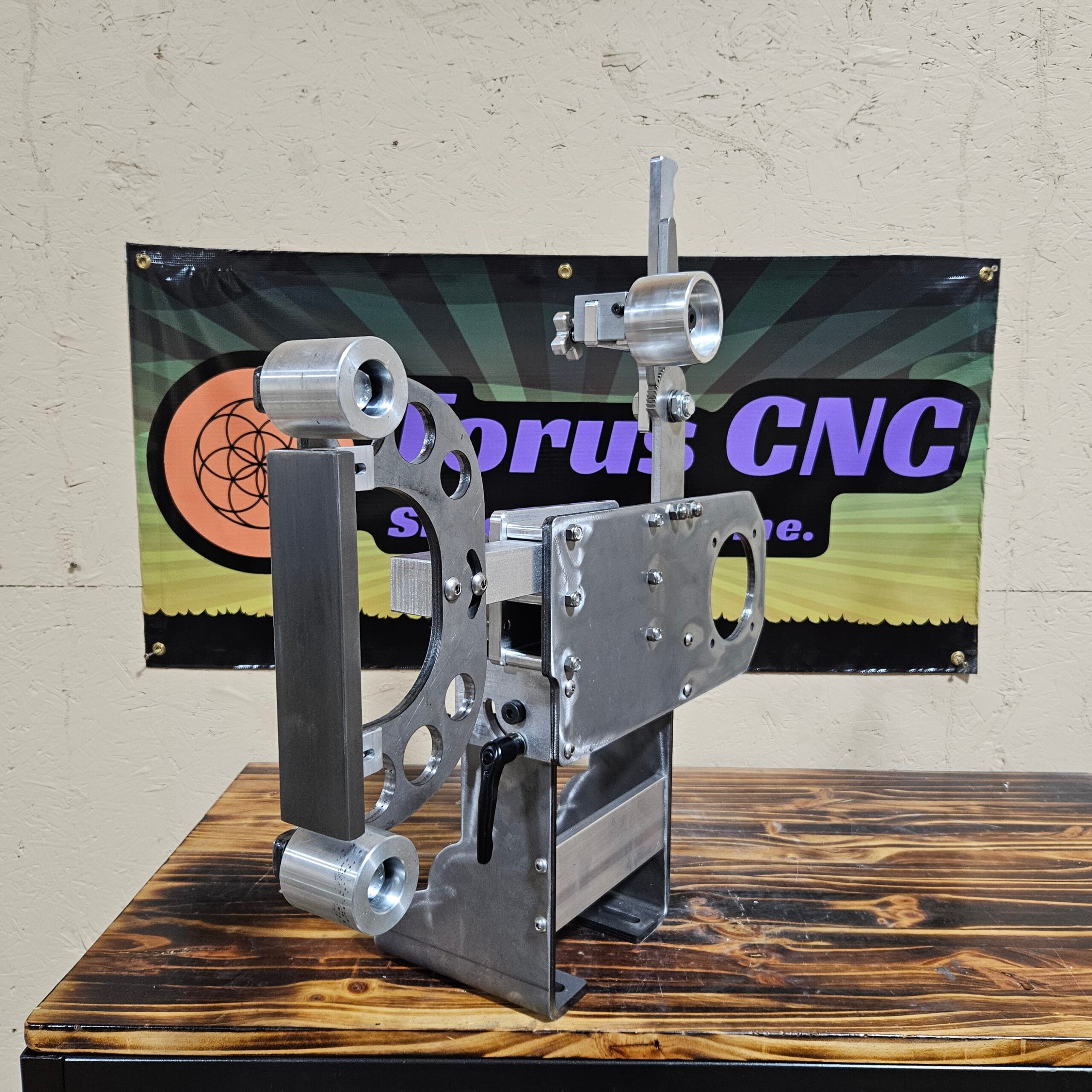 Torus CNC 2x72 belt grinder chassis with tracking and tooling arm.