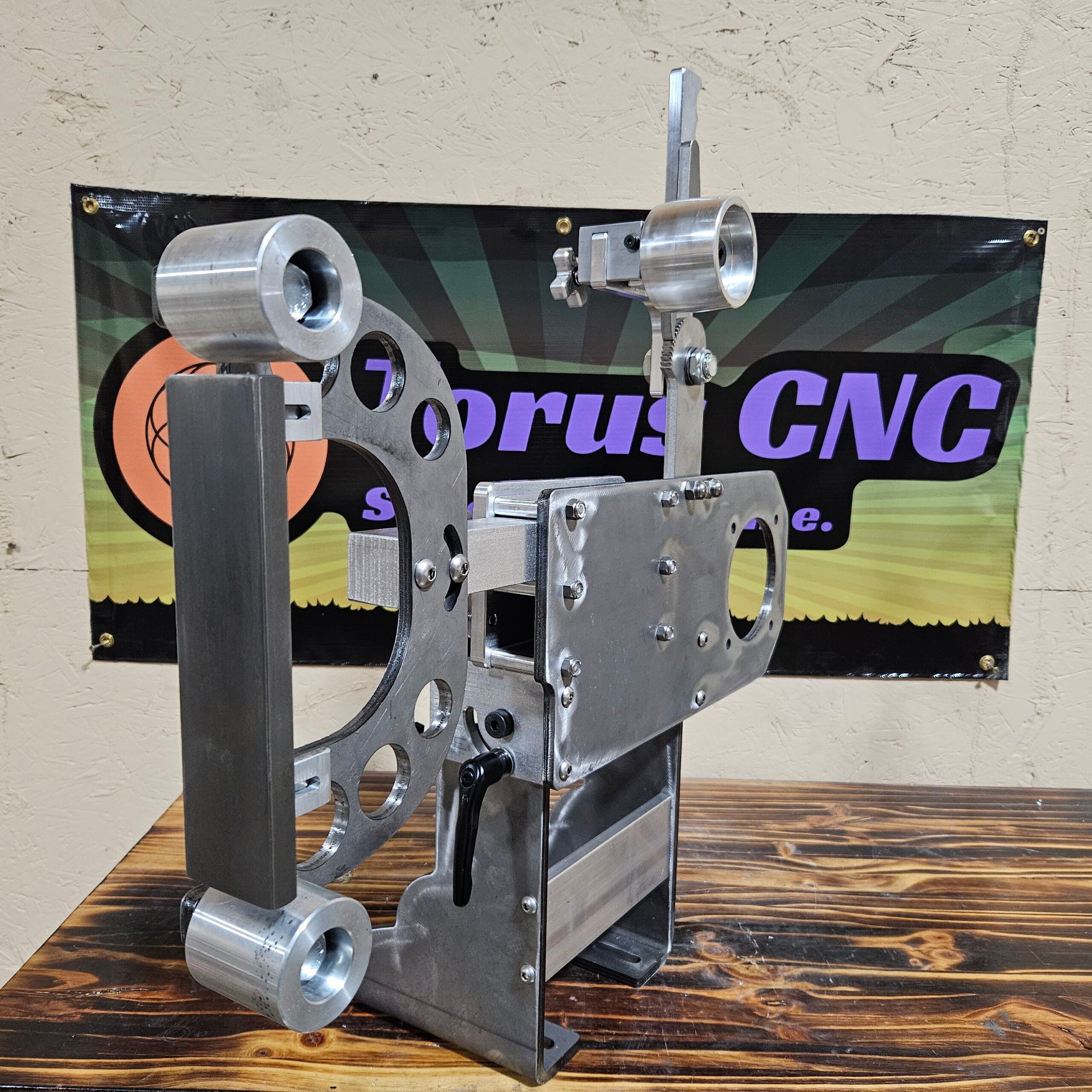 Torus CNC 2x72 belt grinder chassis with tracking and tooling arm.
