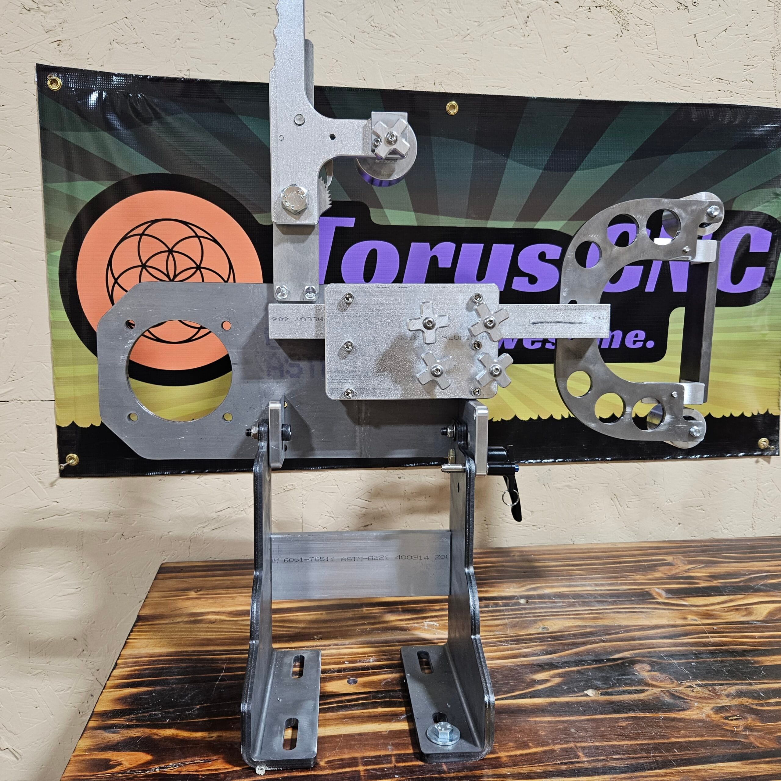 Torus CNC 2x72 belt grinder chassis with tracking and tooling arm.
