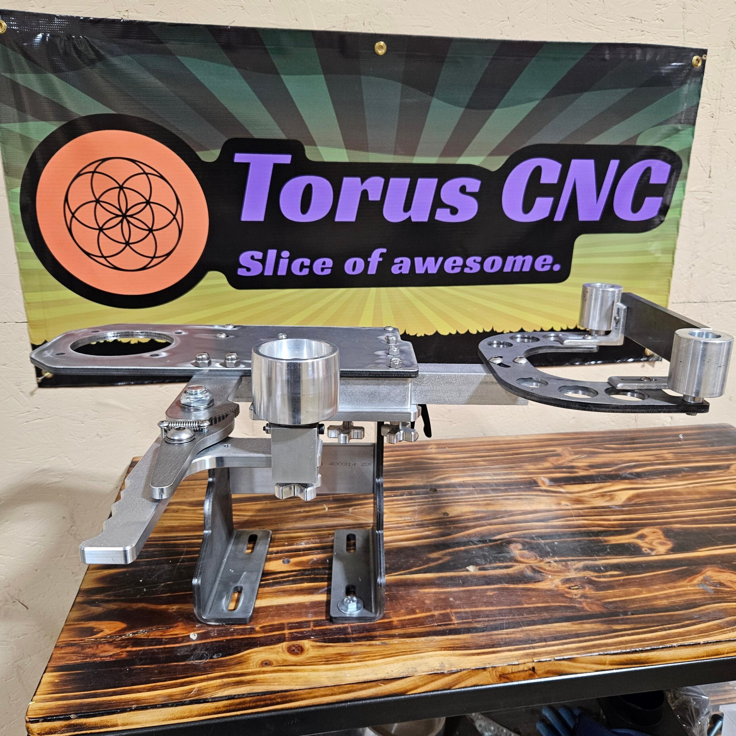 Torus CNC 2x72 belt grinder chassis with tracking and tooling arm.